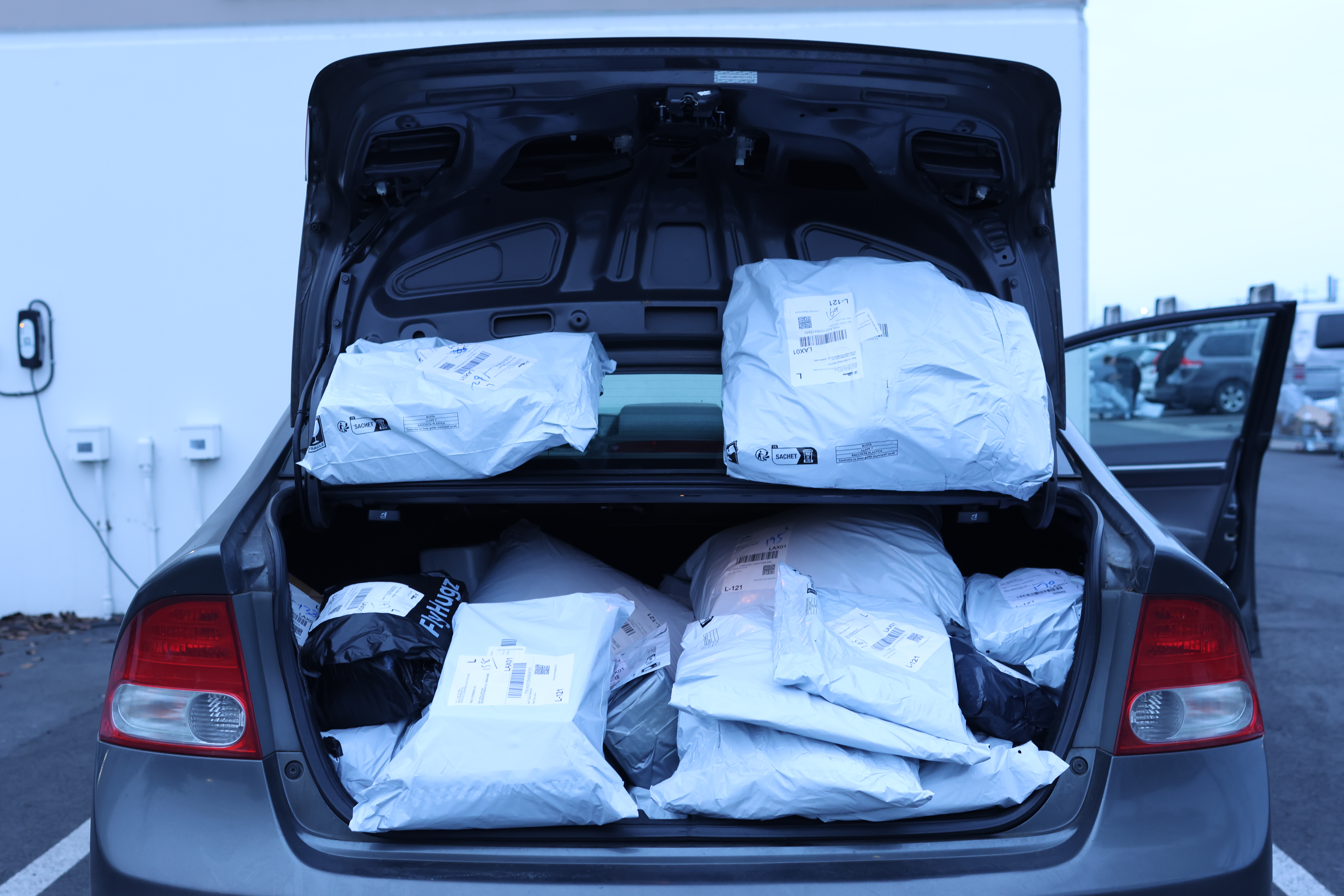 Packages in the trunk of Jiang's car